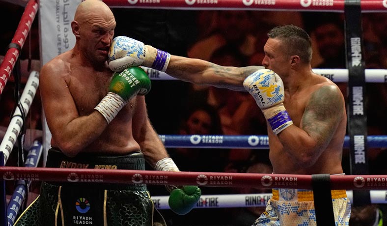 Tyson Fury y Oleksandr Usyk en su primer combate en Riyad