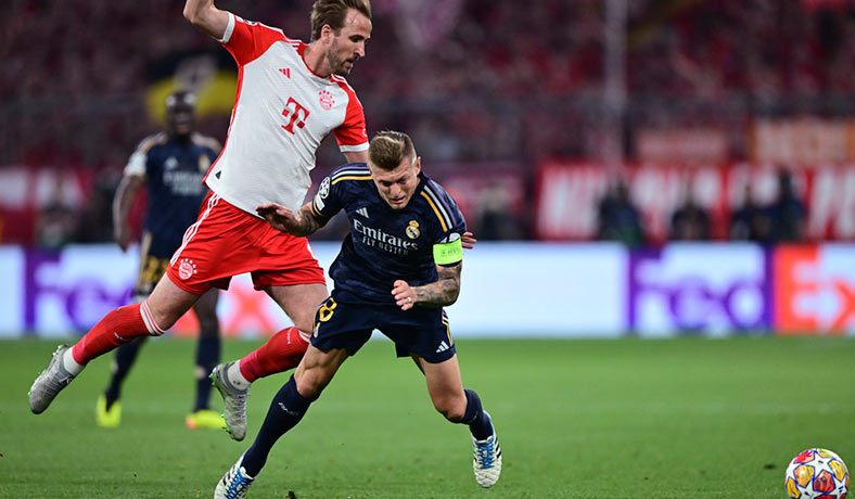 Harry Kane del Bayern ante Toni Kroos del Real Madrid